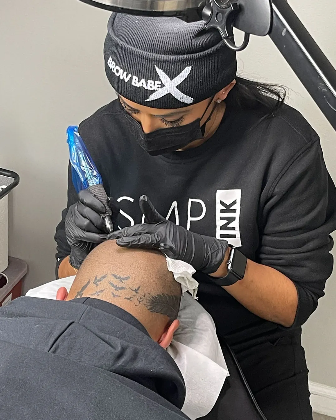 Man with a close-shaved head showing a scalp micropigmentation hairline