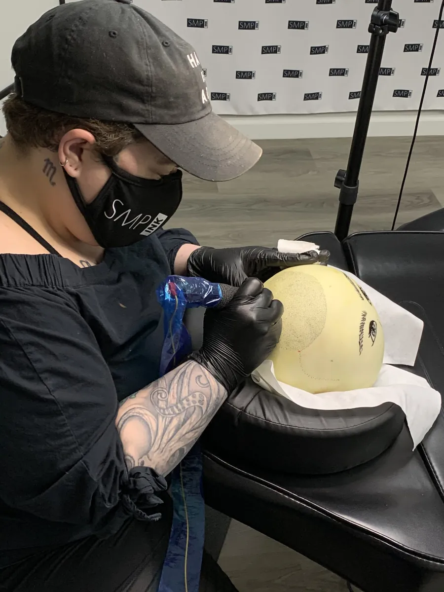 Hands-on scalp micropigmentation training at SMP INK Seattle