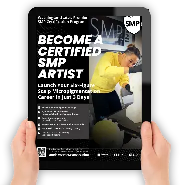 Hands holding the free SMP INK Academy training guide
