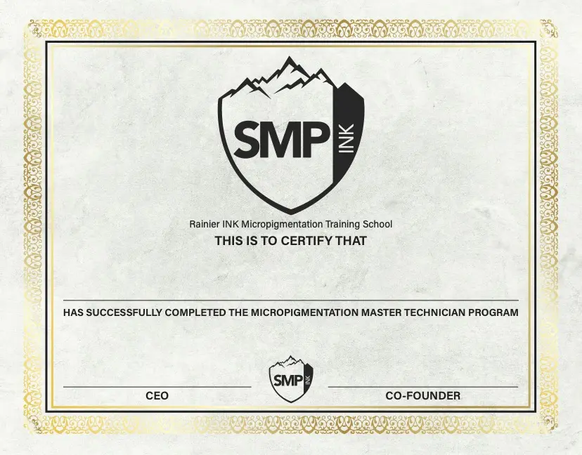 Framed certifications and awards displayed on the SMP INK Seattle studio wall